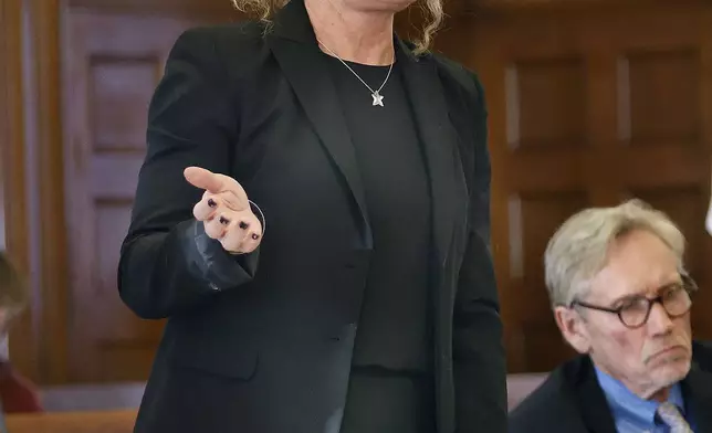 Defense attorney Kelli Porges makes a motion for cell phone and text messages between police officers during the Brian Walshe trial at the Norfolk Superior Court in Dedham, Mass. Monday, Dec. 2, 2024. (Greg Derr/The Patriot Ledger via AP)