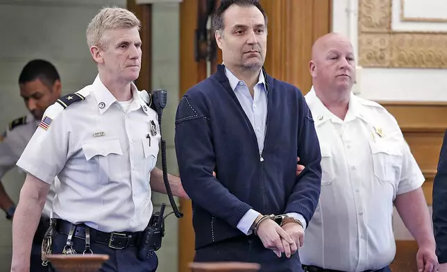 FILE - Brian Walshe, accused of killing wife Anna who disappeared on New Years Day 2023, enters the courtroom for his arraignment, Thursday April 27, 2023, in Dedham, Mass. (Greg Derr/The Patriot Ledger via AP, Pool, File)