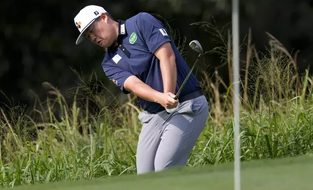 Sungjae Im hits onto the eighth green during the third round of The Sentry golf event, Saturday, Jan. 4, 2025, at Kapalua Plantation Course in Kapalua, Hawaii. (AP Photo/Matt York)