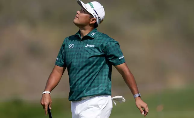 Hideki Matsuyama, of Japan, reacts after missing a putt on the 13th green during the third round of The Sentry golf event, Saturday, Jan. 4, 2025, at Kapalua Plantation Course in Kapalua, Hawaii. (AP Photo/Matt York)