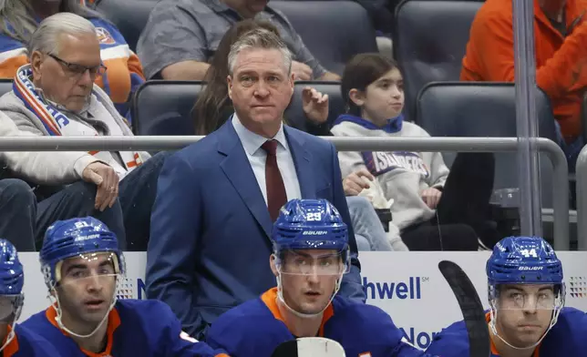 New York Islanders head coach Patrick Roy looks on during the first period of an NHL hockey game against the San Jose Sharks, Saturday, Jan. 18, 2025, in Elmont, N.Y. (AP Photo/Corey Sipkin).