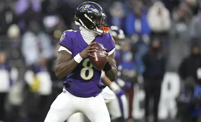 Baltimore Ravens quarterback Lamar Jackson drops back to pass during the first half of an NFL football game against the Cleveland Browns Saturday, Jan. 4, 2025, in Baltimore. (AP Photo/Stephanie Scarbrough)