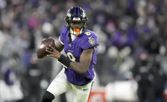 Baltimore Ravens quarterback Lamar Jackson scrambles during the first half of an NFL football game against the Cleveland Browns Saturday, Jan. 4, 2025, in Baltimore. (AP Photo/Stephanie Scarbrough)