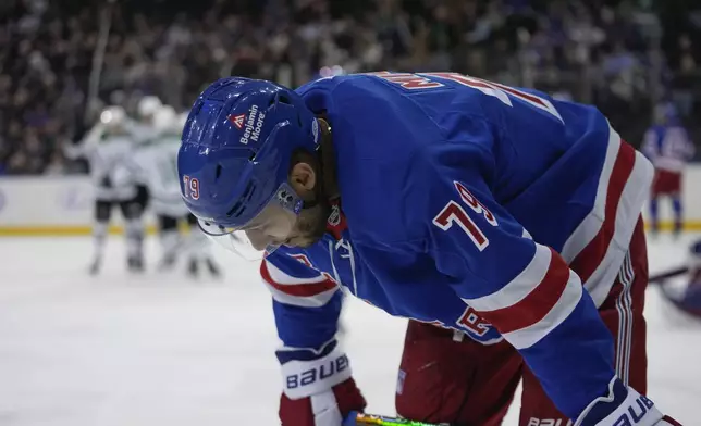 New York Rangers' K'Andre Miller (79) reacts after Dallas Stars' Thomas Harley (55) scored a goal during the third period of an NHL hockey game, Tuesday, Jan. 7, 2025, in New York. (AP Photo/Frank Franklin II)