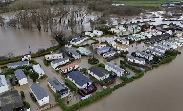 A view of flood waters around the Little Venice caravan park in Yalding, Kent, England, Monday, Jan. 6, 2025. (Gareth Fuller/PA via AP)