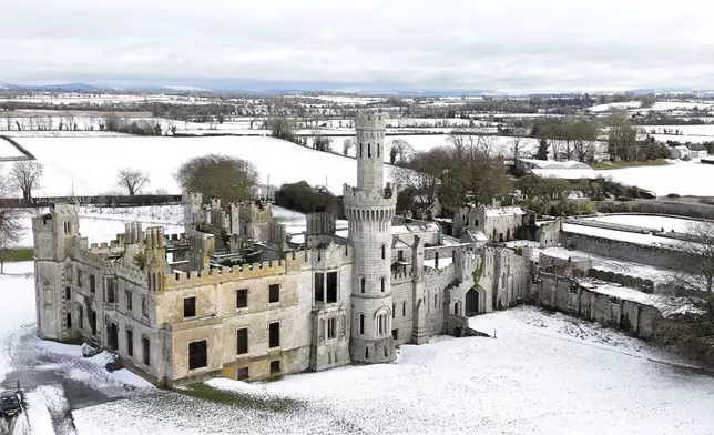 Snow surrounds Duckett's Grove, a ruined 19th-century great house and former estate in County Carlow in Ireland, Monday, Jan. 6, 2025. (Niall Carson/PA via AP)