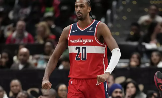 Washington Wizards forward Alex Sarr gestures after scoring against the Chicago Bulls during the first half of an NBA basketball game, Wednesday, Jan. 1, 2025, in Washington. (AP Photo/Jess Rapfogel)