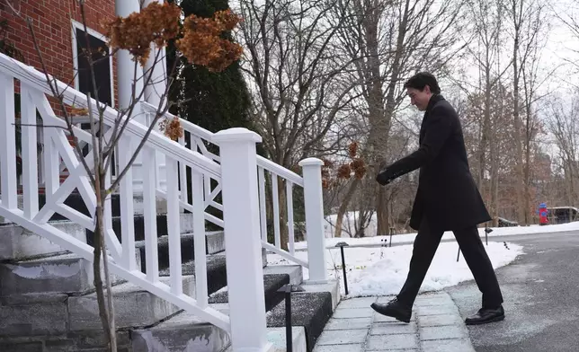 Canada Prime Minister Justin Trudeau leaves a news conference after announcing his resignation as Liberal leader outside Rideau Cottage in Ottawa on Monday, Jan. 6, 2025. (Sean Kilpatrick/The Canadian Press via AP)