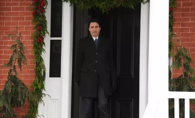 Canada Prime Minister Justin Trudeau arrives to make an announcement outside Rideau Cottage in Ottawa on Monday, Jan. 6, 2025. (Sean Kilpatrick/The Canadian Press via AP)