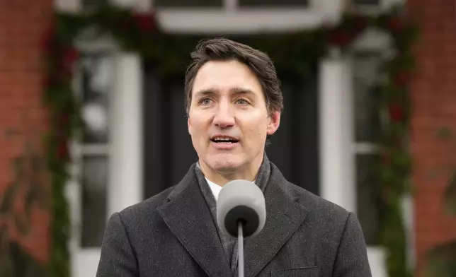 Canada Prime Minister Justin Trudeau makes an announcement outside Rideau Cottage in Ottawa on Monday, Jan. 6, 2025. (Adrian Wyld/The Canadian Press via AP)