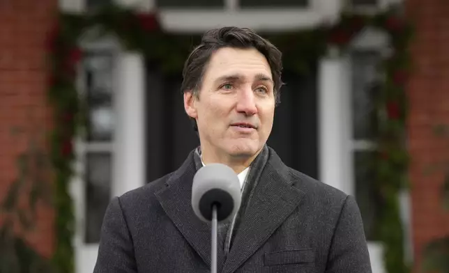 Canada Prime Minister Justin Trudeau makes an announcement outside Rideau Cottage in Ottawa on Monday, Jan. 6, 2025. (Adrian Wyld/The Canadian Press via AP)