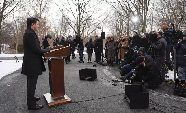 Canada Prime Minister Justin Trudeau announces his resignation as Liberal leader and prime minister outside Rideau Cottage in Ottawa on Monday, Jan. 6, 2025. (Sean Kilpatrick/The Canadian Press via AP)