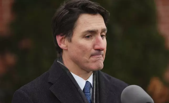 Canada Prime Minister Justin Trudeau announces his resignation as Liberal leader and prime minister outside Rideau Cottage in Ottawa on Monday, Jan. 6, 2025. (Sean Kilpatrick/The Canadian Press via AP)