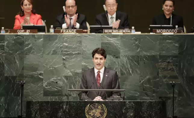 FILE - Justin Trudeau, Prime Minister of Canada, speaks before signing the Paris Agreement on climate change on April 22, 2016, at U.N. headquarters. (AP Photo/Mark Lennihan, File)