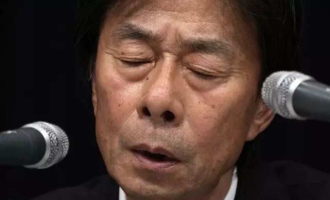 Koichi Minato, President and CEO of Fuji Television Network, answers a question during a news conference at the Fuji Television headquarters in Tokyo, Monday, Jan. 27, 2025. (AP Photo/Eugene Hoshiko)