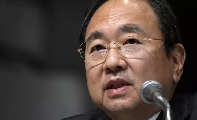 Kenji Shimizu, newly appointed president and CEO of Fuji Television Network, answers a question during a news conference at the Fuji Television headquarters in Tokyo, Monday, Jan. 27, 2025. (AP Photo/Eugene Hoshiko)