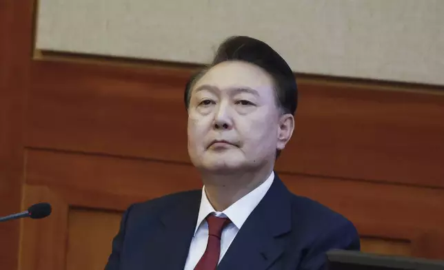 South Korea's impeached President Yoon Suk Yeol, attends the fourth hearing of his impeachment trial over his short-lived imposition of martial law at the Constitutional Court in Seoul, South Korea, Jan.23, 2025. (Jeon Heon Kyun/Pool Photo via AP)