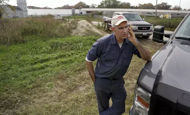 FILE - Doug Corwin talks about the history and development of his duck farm, Crescent Duck Farm, in Aquebogue, N.Y., Oct. 29, 2014. (AP Photo/Julie Jacobson, File)
