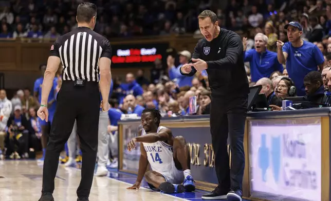 Duke head coach Jon Scheyer reacts to a call during the first half of an NCAA college basketball game against Pittsburgh in Durham, N.C., Tuesday, Jan. 7, 2025. (AP Photo/Ben McKeown)