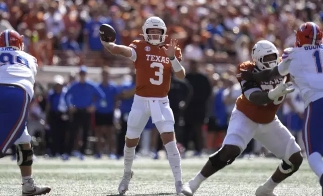 FILE - Texas quarterback Quinn Ewers (3) throws against Florida during the first half of an NCAA college football game in Austin, Texas, Saturday, Nov. 9, 2024. (AP Photo/Eric Gay, File)