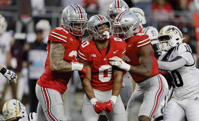 FILE - Ohio State linebacker Cody Simon (0) celebrates after his sack against Western Michigan during the first half of an NCAA college football game Saturday, Sept. 7, 2024, in Columbus, Ohio. (AP Photo/Jay LaPrete, File)