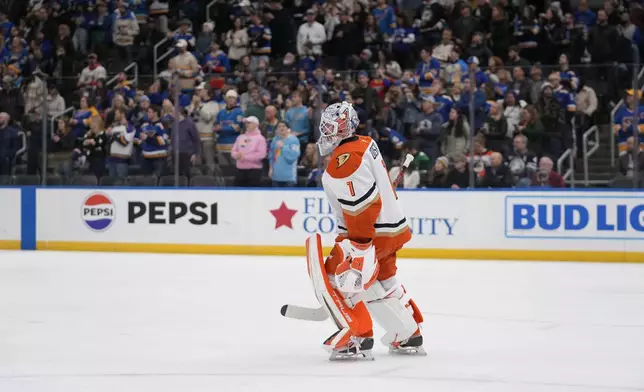 Anaheim Ducks goaltender Lukas Dostal (1) leaves the game after giving up a goal to St. Louis Blues' Pavel Buchnevich during the second period of an NHL hockey game Thursday, Jan. 9, 2025, in St. Louis. (AP Photo/Jeff Roberson)