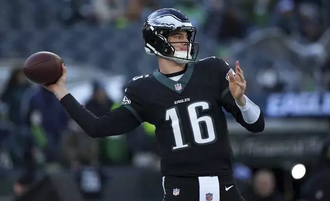 Philadelphia Eagles quarterback Tanner McKee warms up before an NFL football game against the New York Giants on Sunday, Jan. 5, 2025, in Philadelphia. (AP Photo/Matt Slocum)