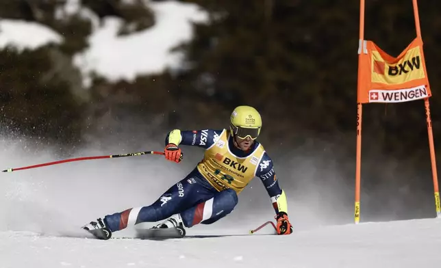 United States' Ryan Cochran Siegle speeds down the course during an alpine ski, men's World Cup Super-G, in Wengen, Switzerland, Friday, Jan. 17, 2025. (AP Photo/Gabriele Facciotti)