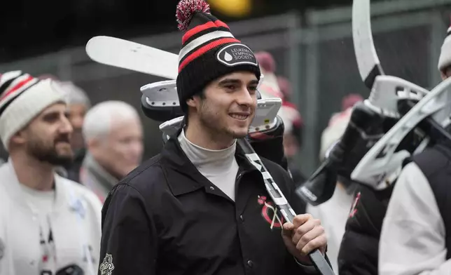 Chicago Blackhawks center Frank Nazar arrives for the NHL Winter Classic outdoor hockey game featuring the Blackhawks and St. Louis Blues at Wrigley Field, Tuesday, Dec. 31, 2024, in Chicago. (AP Photo/Erin Hooley)