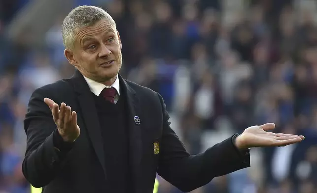 FILE - Manchester United's manager Ole Gunnar Solskjaer reacts after the English Premier League soccer match between Leicester City and Manchester United at King Power stadium in Leicester, England, Oct. 16, 2021. (AP Photo/Rui Vieira, file)