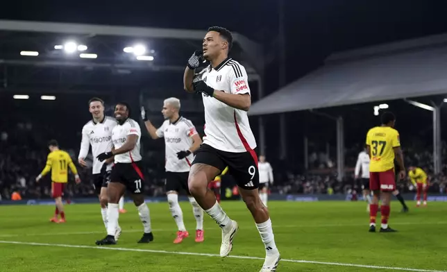 Fulham's Rodrigo Muniz celebrates scoring during the English FA Cup third round soccer match between Fulham and Watford at Craven Cottage, London, Thursday Jan. 9, 2025. (Bradley Collyer/PA via AP)