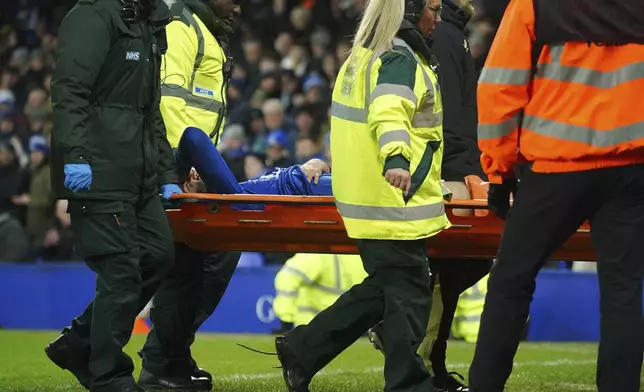 Everton's Armando Broja leaves the game on the stretcher after picking up an injury during the English FA Cup third round soccer match between Everton and Peterborough United at Goodison Park, Liverpool, England, Thursday Jan. 9, 2025. (Peter Byrne/PA via AP)