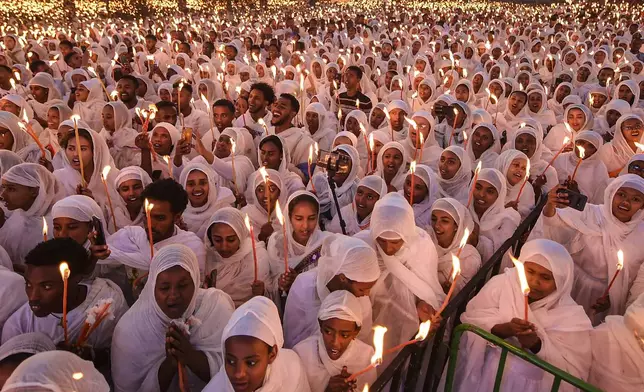 Ethiopian pilgrims pray during a Mass service for Ethiopian Christmas at the Bole Medhane Alem church in Addis Ababa, Ethiopia, Monday, Jan. 6, 2025. (AP Photo)