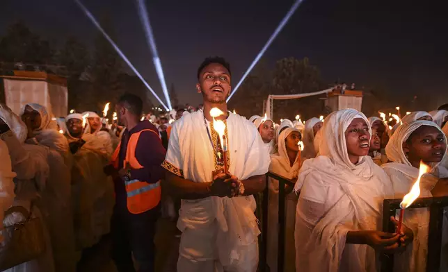 Ethiopian pilgrims pray during a Mass service for Ethiopian Christmas at the Bole Medhane Alem cathedral in Addis Ababa, Ethiopia, Monday, Jan. 6, 2025. (AP Photo)