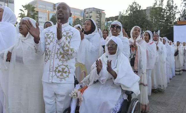 Ethiopian pilgrims pray during a Mass service for Ethiopian Christmas at the Bole Medhane Alem cathedral in Addis Ababa, Ethiopia, Monday, Jan. 6, 2025. (AP Photo)