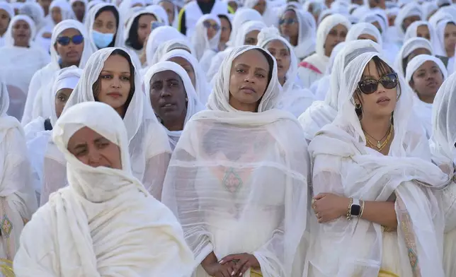 Ethiopian pilgrims pray during a Mass service for Ethiopian Christmas at the Bole Medhane Alem cathedral in Addis Ababa, Ethiopia, Monday, Jan. 6, 2025. (AP Photo)