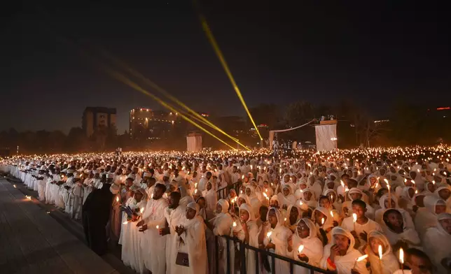 Ethiopian pilgrims pray during a Mass service for Ethiopian Christmas at the Bole Medhane Alem church in Addis Ababa, Ethiopia, Monday, Jan. 6, 2025. (AP Photo)