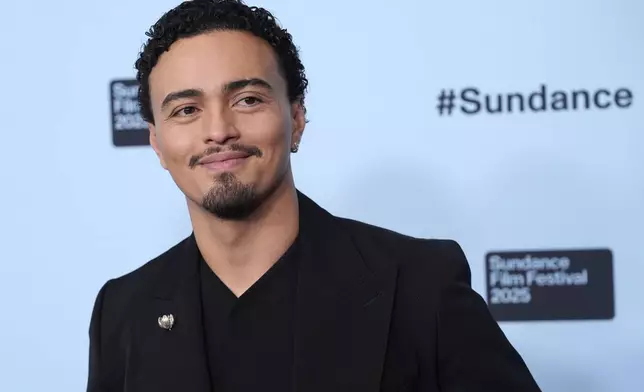 Tonatiuh, a cast member in "Kiss of the Spider Woman," poses at the premiere of the film during the Sundance Film Festival on Sunday, Jan. 26, 2025, in Park City, Utah. (AP Photo/Chris Pizzello)