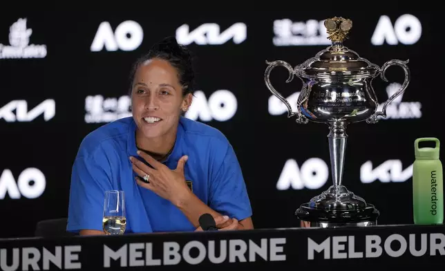 Madison Keys of the U.S. speaks during a press conference after defeating Aryna Sabalenka of Belarus in the women's singles final at the Australian Open tennis championship to win the Daphne Akhurst Memorial Cup, in Melbourne, Australia, Saturday, Jan. 25, 2025. (AP Photo/Vincent Thian)