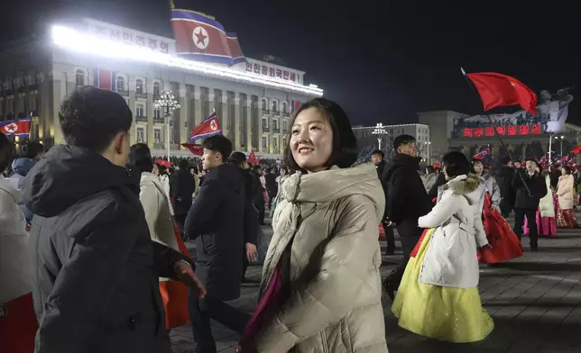 Youth and students gather for a New Year celebration at Kim Il Sung Square on Tuesday, Dec. 31, 2024 in Pyongyang, North Korea. (AP Photo/Cha Song Ho)