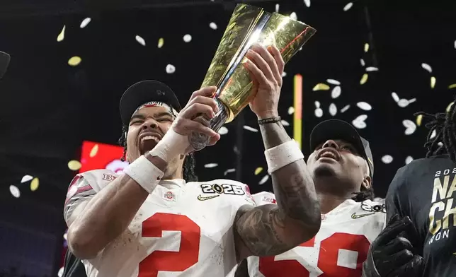 Ohio State wide receiver Emeka Egbuka celebrates after their win against Notre Dame in the College Football Playoff national championship game Monday, Jan. 20, 2025, in Atlanta. (AP Photo/Brynn Anderson)