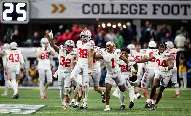 Ohio State place kicker Jayden Fielding celebrates after a field goal against Notre Dame during second half of the College Football Playoff national championship game Monday, Jan. 20, 2025, in Atlanta. (AP Photo/Jacob Kupferman)