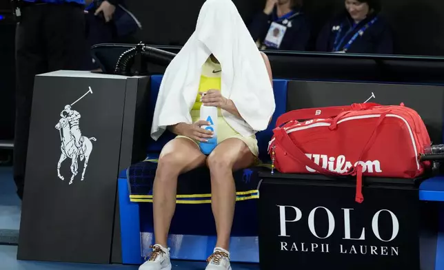 Aryna Sabalenka of Belarus reacts after the women's singles final against Madison Keys of the U.S. at the Australian Open tennis championship in Melbourne, Australia, Saturday, Jan. 25, 2025. (AP Photo/Asanka Brendon Ratnayake)