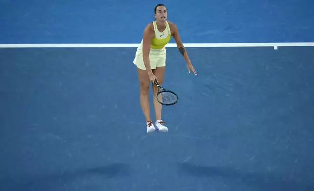 Aryna Sabalenka of Belarus plays a forehand to Madison Keys of the U.S. during the women's singles final at the Australian Open tennis championship in Melbourne, Australia, Saturday, Jan. 25, 2025. (AP Photo/Manish Swarup)