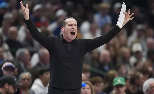 Cleveland Cavaliers head coach Kenny Atkinson reacts during the first half of an NBA basketball game against the Dallas Mavericks, Friday, Jan. 3, 2025, in Dallas. (AP Photo/Julio Cortez)