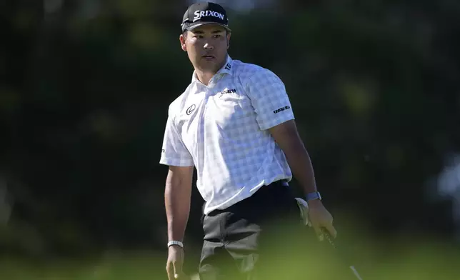 Hideki Matsuyama, of Japan, watches a missed putt at the third hole during the second round of The Sentry golf event, Friday, Jan. 3, 2025, at the Kapalua Plantation Course in Kapalua, Hawaii. (AP Photo/Matt York)