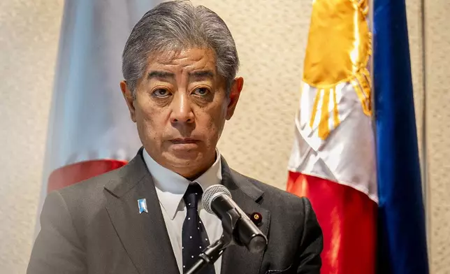 Japanese Foreign Minister Takeshi Iwaya attends a joint press conference with Philippine Foreign Secretary Enrique Manalo in Taguig City, Philippines Wednesday, Jan. 15, 2025. (Lisa Marie David/Pool Photo via AP)