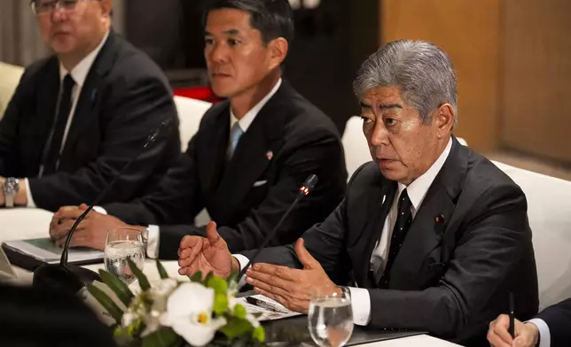 Japanese Foreign Minister Takeshi Iwaya, right, speaks with Philippine Foreign Secretary Enrique Manalo, unseen, during their bilateral meeting in Taguig City, Philippines Wednesday, Jan. 15, 2025. (Lisa Marie David/Pool Photo via AP)