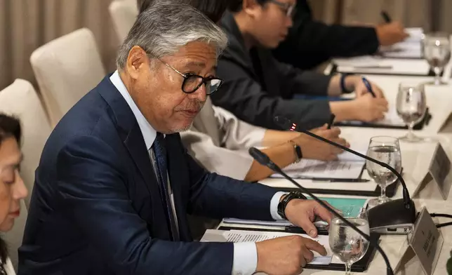 Philippine Foreign Secretary Enrique Manalo speaks with Japanese Foreign Minister Takeshi Iwaya, unseen, during their bilateral meeting in Taguig City, Philippines Wednesday, Jan. 15, 2025. (Lisa Marie David/Pool Photo via AP)