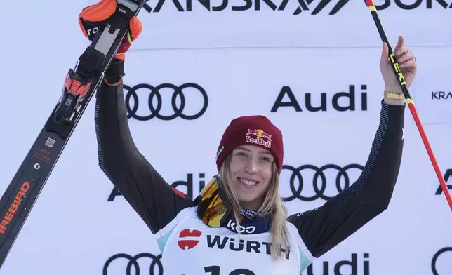 Second placed Albania's Lara Colturi celebrates after an alpine ski, women's World Cup giant slalom race in Kranjska Gora, Slovenia, Saturday, Jan. 4, 2025. (AP Photo/Giovanni Auletta)